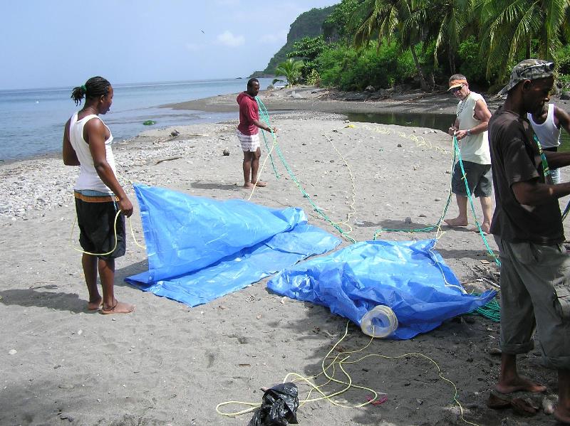 Step 2 - Add plastic tarps to that will act as the FAD shelter for fish; when deployed at sea the tarps will be 20-50 feet beneath the surface. - photo by GGerman